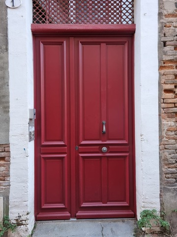 Porte d' entrée en bois à l' identique de l' existant