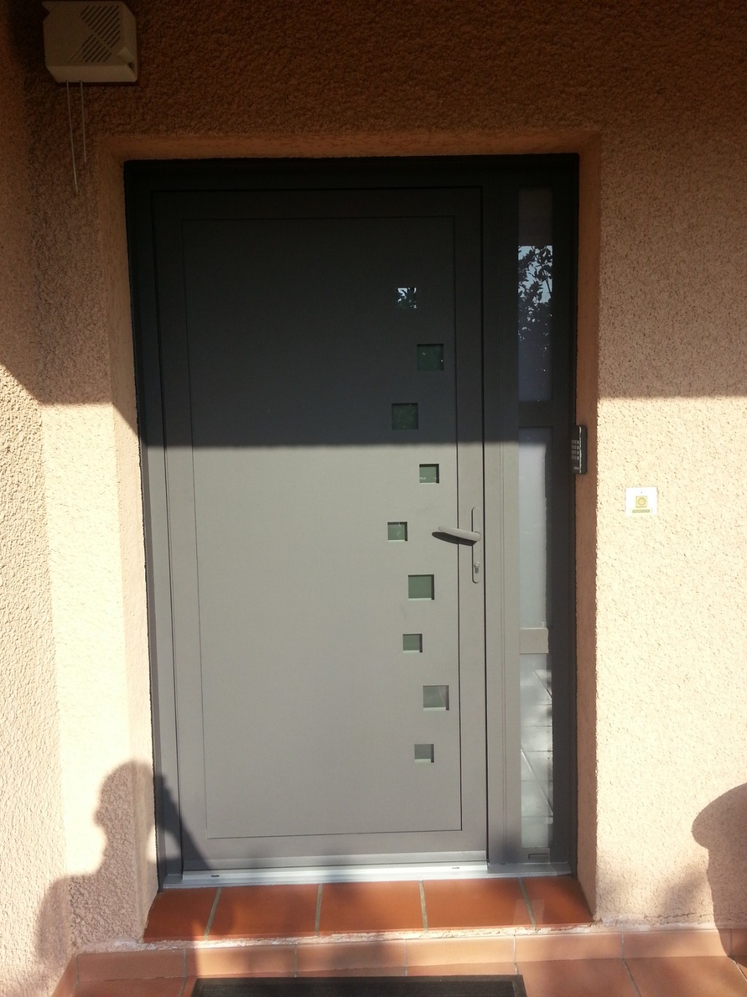 Porte d’entrée alu chantier Colomier